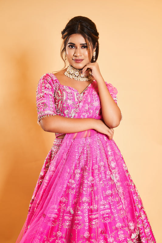 Elegant Pink Bridal Lehenga with Intricate Floral Designs