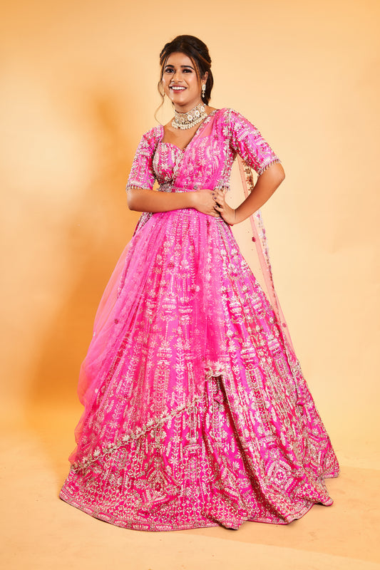 Elegant Pink Bridal Lehenga with Intricate Floral Designs